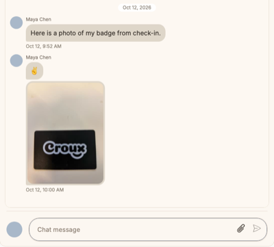 A conversation with a photo attachment, and the message box with the paperclip and send buttons
